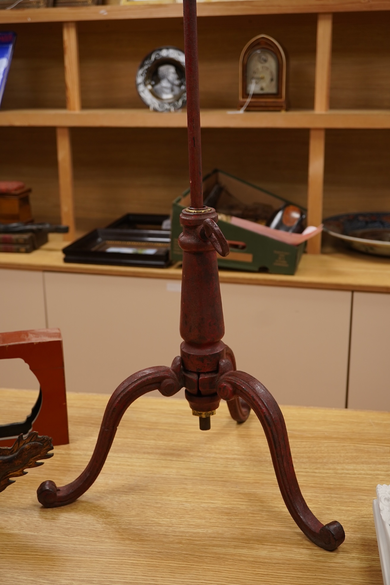 A 19th century red japanned (heavy) cast iron telescopic tripod base, 63cm minimum
